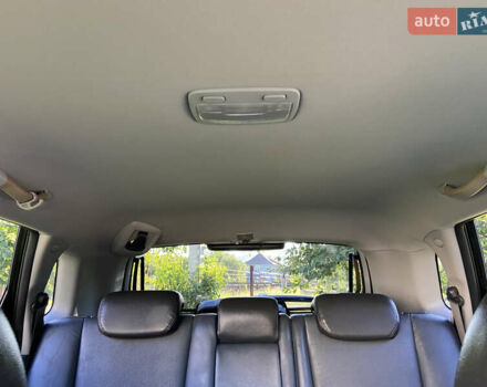 Черный Хендай Туксон, объемом двигателя 1.98 л и пробегом 197 тыс. км за 8000 $, фото 43 на Automoto.ua