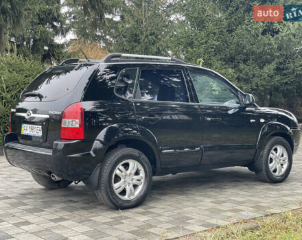 Черный Хендай Туксон, объемом двигателя 2 л и пробегом 180 тыс. км за 7700 $, фото 11 на Automoto.ua