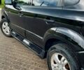 Черный Хендай Туксон, объемом двигателя 2 л и пробегом 175 тыс. км за 8900 $, фото 4 на Automoto.ua