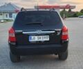 Черный Хендай Туксон, объемом двигателя 2 л и пробегом 232 тыс. км за 1700 $, фото 4 на Automoto.ua