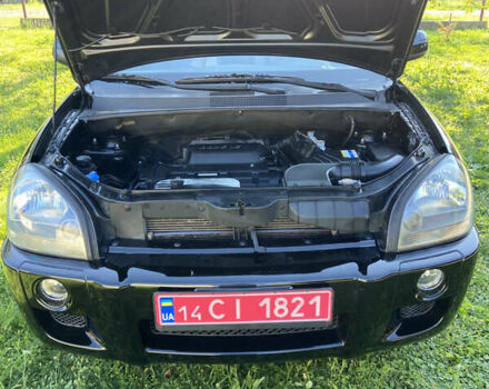 Черный Хендай Туксон, объемом двигателя 1.98 л и пробегом 197 тыс. км за 8000 $, фото 45 на Automoto.ua