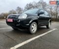 Черный Хендай Туксон, объемом двигателя 1.98 л и пробегом 240 тыс. км за 7690 $, фото 13 на Automoto.ua