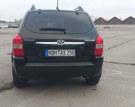 Черный Хендай Туксон, объемом двигателя 1.98 л и пробегом 155 тыс. км за 7999 $, фото 10 на Automoto.ua