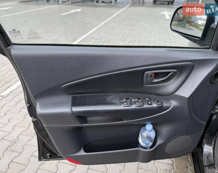 Черный Хендай Туксон, объемом двигателя 2 л и пробегом 182 тыс. км за 6999 $, фото 9 на Automoto.ua