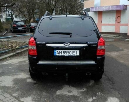 Черный Хендай Туксон, объемом двигателя 2 л и пробегом 200 тыс. км за 8300 $, фото 4 на Automoto.ua