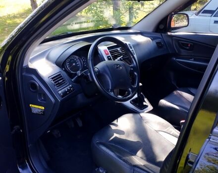 Черный Хендай Туксон, объемом двигателя 2 л и пробегом 230 тыс. км за 8000 $, фото 7 на Automoto.ua