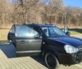 Черный Хендай Туксон, объемом двигателя 1.98 л и пробегом 210 тыс. км за 7200 $, фото 8 на Automoto.ua