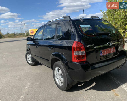 Чорний Хендай Туксон, об'ємом двигуна 2 л та пробігом 56 тис. км за 9500 $, фото 35 на Automoto.ua