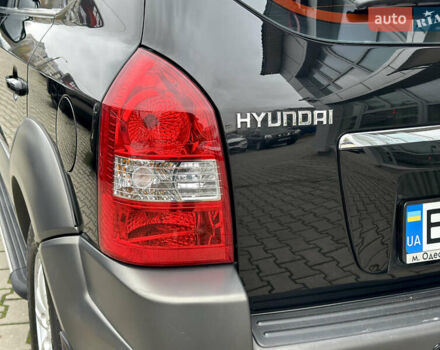 Чорний Хендай Туксон, об'ємом двигуна 2.66 л та пробігом 145 тис. км за 8900 $, фото 7 на Automoto.ua