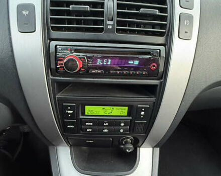 Черный Хендай Туксон, объемом двигателя 1.98 л и пробегом 159 тыс. км за 7600 $, фото 29 на Automoto.ua