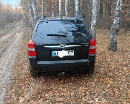Черный Хендай Туксон, объемом двигателя 2 л и пробегом 240 тыс. км за 8800 $, фото 2 на Automoto.ua