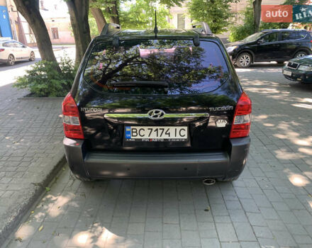 Черный Хендай Туксон, объемом двигателя 1.98 л и пробегом 232 тыс. км за 9100 $, фото 11 на Automoto.ua