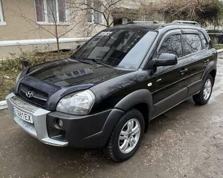 Черный Хендай Туксон, объемом двигателя 1.98 л и пробегом 273 тыс. км за 7400 $, фото 2 на Automoto.ua