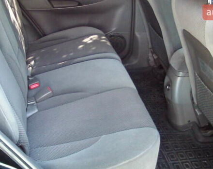 Черный Хендай Туксон, объемом двигателя 1.98 л и пробегом 234 тыс. км за 7800 $, фото 8 на Automoto.ua