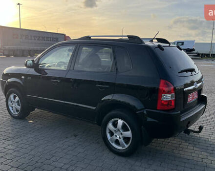 Черный Хендай Туксон, объемом двигателя 1.98 л и пробегом 243 тыс. км за 8500 $, фото 14 на Automoto.ua