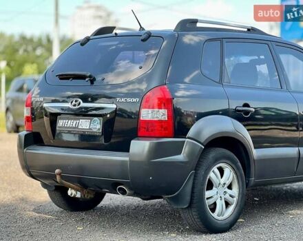 Черный Хендай Туксон, объемом двигателя 2 л и пробегом 227 тыс. км за 8200 $, фото 13 на Automoto.ua
