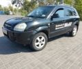Черный Хендай Туксон, объемом двигателя 2 л и пробегом 250 тыс. км за 3700 $, фото 2 на Automoto.ua
