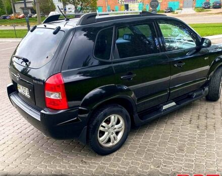 Черный Хендай Туксон, объемом двигателя 2 л и пробегом 175 тыс. км за 8900 $, фото 10 на Automoto.ua