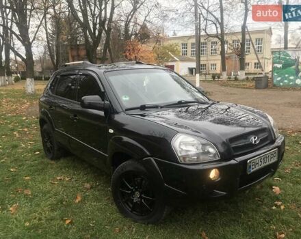 Черный Хендай Туксон, объемом двигателя 2 л и пробегом 210 тыс. км за 8999 $, фото 18 на Automoto.ua
