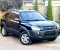Черный Хендай Туксон, объемом двигателя 2 л и пробегом 164 тыс. км за 7950 $, фото 1 на Automoto.ua