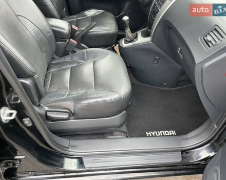 Черный Хендай Туксон, объемом двигателя 2 л и пробегом 180 тыс. км за 7700 $, фото 41 на Automoto.ua