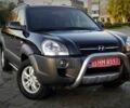 Черный Хендай Туксон, объемом двигателя 2 л и пробегом 230 тыс. км за 8700 $, фото 1 на Automoto.ua