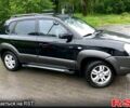 Черный Хендай Туксон, объемом двигателя 2 л и пробегом 193 тыс. км за 8000 $, фото 1 на Automoto.ua