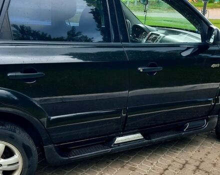 Черный Хендай Туксон, объемом двигателя 2 л и пробегом 175 тыс. км за 8900 $, фото 8 на Automoto.ua