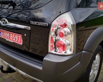 Чорний Хендай Туксон, об'ємом двигуна 2 л та пробігом 229 тис. км за 8600 $, фото 76 на Automoto.ua