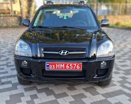 Черный Хендай Туксон, объемом двигателя 2 л и пробегом 190 тыс. км за 8150 $, фото 4 на Automoto.ua