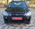 Черный Хендай Туксон, объемом двигателя 2 л и пробегом 190 тыс. км за 8150 $, фото 4 на Automoto.ua