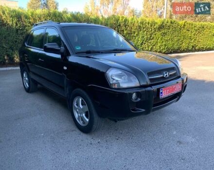 Чорний Хендай Туксон, об'ємом двигуна 2 л та пробігом 56 тис. км за 9500 $, фото 5 на Automoto.ua
