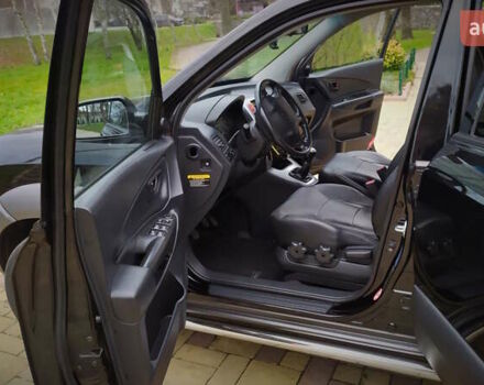 Чорний Хендай Туксон, об'ємом двигуна 2 л та пробігом 229 тис. км за 8600 $, фото 98 на Automoto.ua