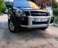 Черный Хендай Туксон, объемом двигателя 2 л и пробегом 270 тыс. км за 7400 $, фото 1 на Automoto.ua