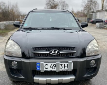 Черный Хендай Туксон, объемом двигателя 2 л и пробегом 330 тыс. км за 4350 $, фото 1 на Automoto.ua
