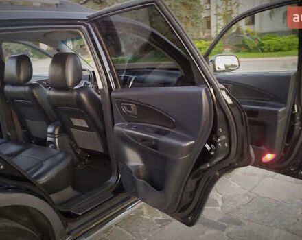 Черный Хендай Туксон, объемом двигателя 2 л и пробегом 230 тыс. км за 8600 $, фото 178 на Automoto.ua