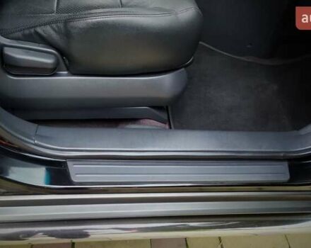 Чорний Хендай Туксон, об'ємом двигуна 2 л та пробігом 229 тис. км за 8600 $, фото 141 на Automoto.ua