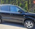 Черный Хендай Туксон, объемом двигателя 2 л и пробегом 152 тыс. км за 7950 $, фото 1 на Automoto.ua