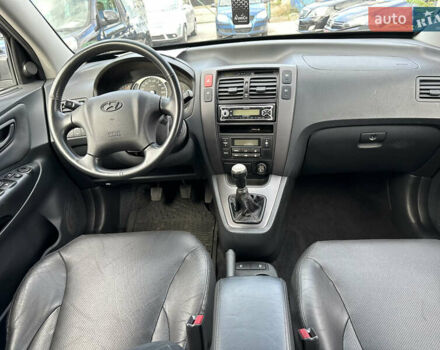 Чорний Хендай Туксон, об'ємом двигуна 2 л та пробігом 180 тис. км за 7999 $, фото 11 на Automoto.ua