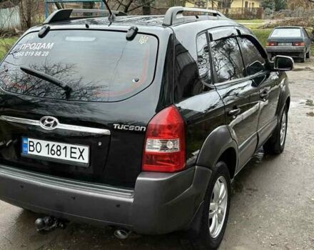 Черный Хендай Туксон, объемом двигателя 1.98 л и пробегом 273 тыс. км за 7400 $, фото 3 на Automoto.ua