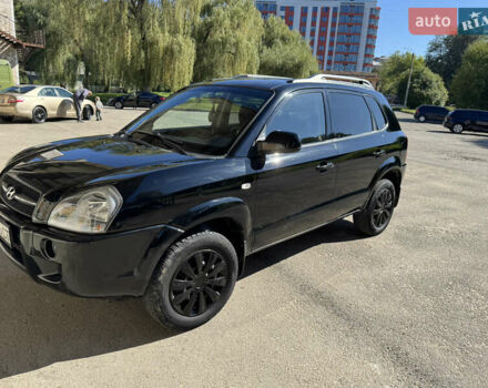 Черный Хендай Туксон, объемом двигателя 2 л и пробегом 189 тыс. км за 8250 $, фото 14 на Automoto.ua