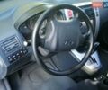 Черный Хендай Туксон, объемом двигателя 2 л и пробегом 270 тыс. км за 10250 $, фото 33 на Automoto.ua