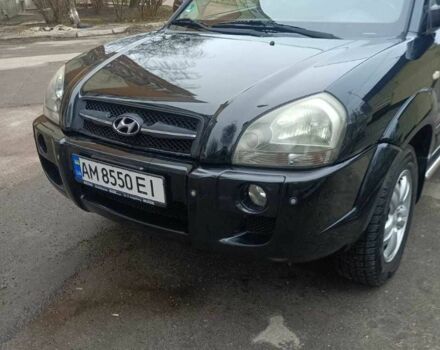 Черный Хендай Туксон, объемом двигателя 2 л и пробегом 200 тыс. км за 8300 $, фото 1 на Automoto.ua