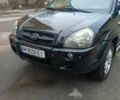 Черный Хендай Туксон, объемом двигателя 2 л и пробегом 200 тыс. км за 8300 $, фото 1 на Automoto.ua