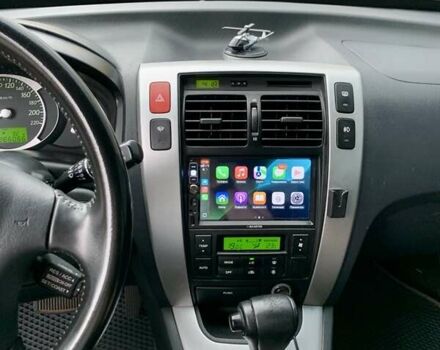 Черный Хендай Туксон, объемом двигателя 2.7 л и пробегом 266 тыс. км за 7700 $, фото 11 на Automoto.ua