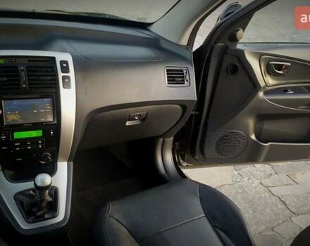 Черный Хендай Туксон, объемом двигателя 2 л и пробегом 230 тыс. км за 8600 $, фото 157 на Automoto.ua