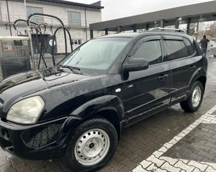 Черный Хендай Туксон, объемом двигателя 2 л и пробегом 177 тыс. км за 8500 $, фото 1 на Automoto.ua
