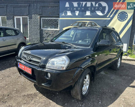 Черный Хендай Туксон, объемом двигателя 2 л и пробегом 198 тыс. км за 8600 $, фото 21 на Automoto.ua