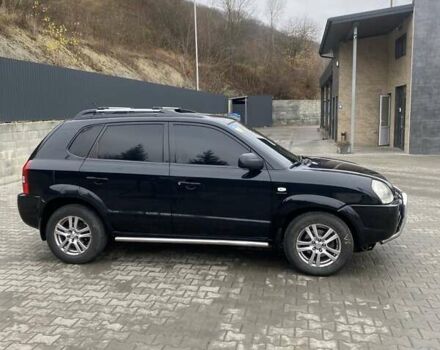 Чорний Хендай Туксон, об'ємом двигуна 1.99 л та пробігом 345 тис. км за 7600 $, фото 8 на Automoto.ua