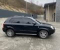 Чорний Хендай Туксон, об'ємом двигуна 1.99 л та пробігом 345 тис. км за 7600 $, фото 8 на Automoto.ua